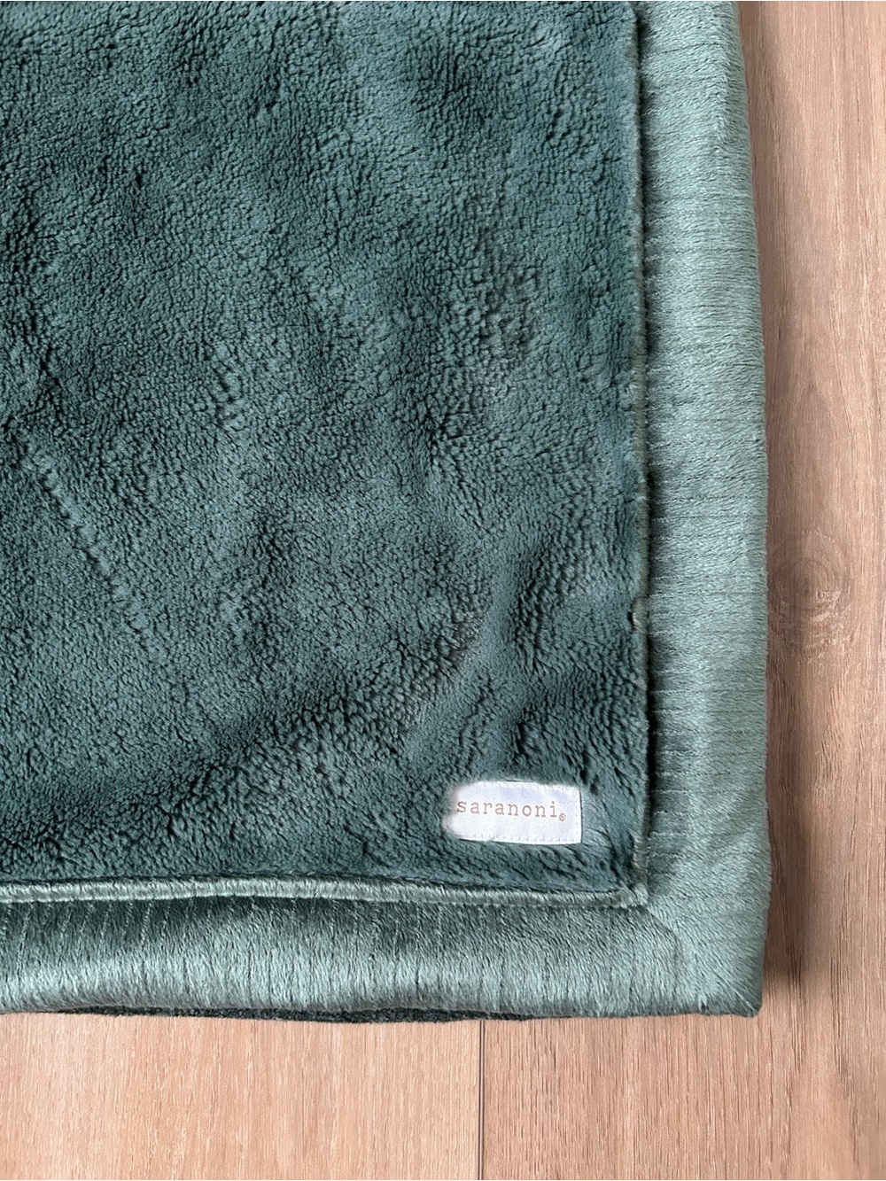 Brand new Saranoni Lush Toddler Blanket in Hunter green. Never used!